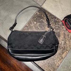 Coach black canvas and leather handbag